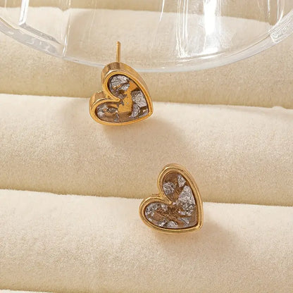 Mini pendientes delicados con forma de corazón