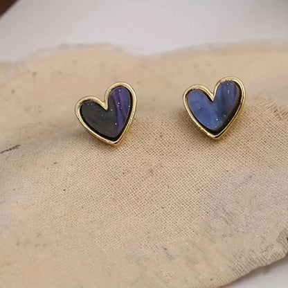 Mini pendientes delicados con forma de corazón